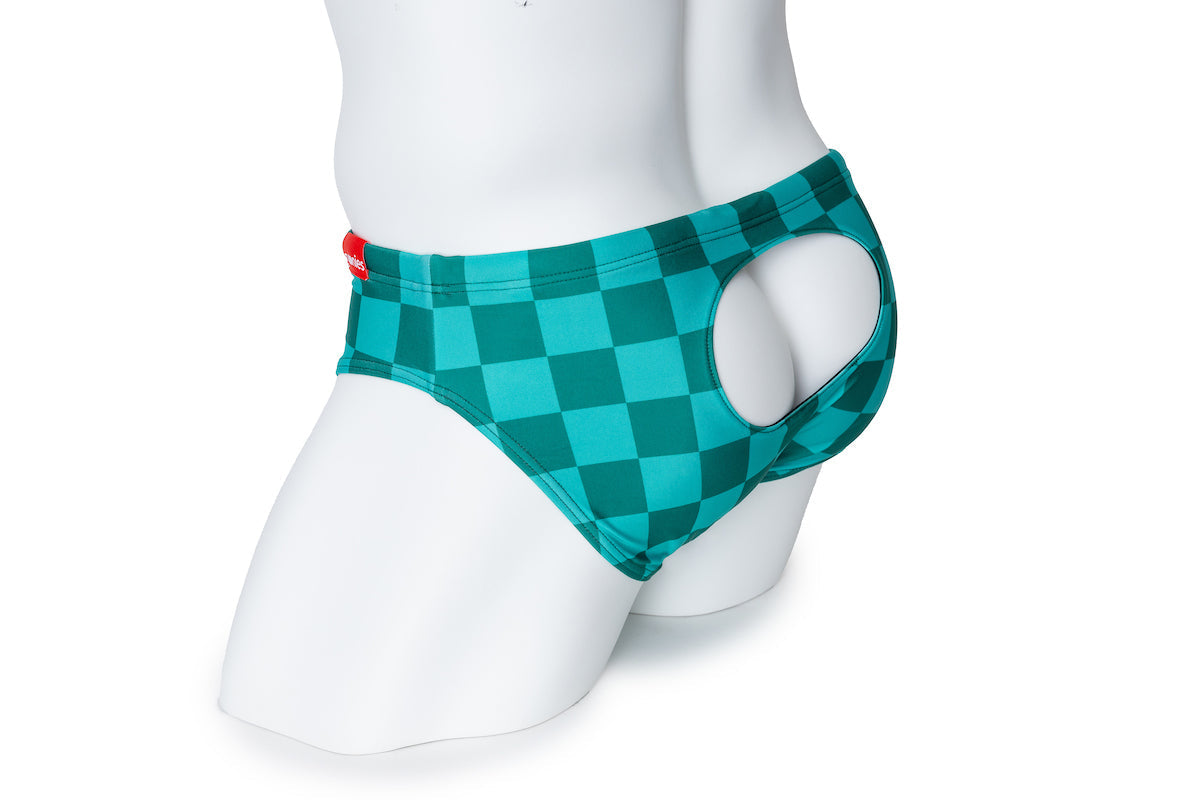 A mannequin wearing turquoise underwear with a circular transparent window on the back.